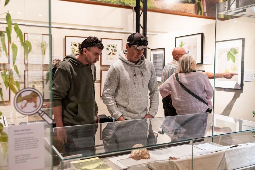 two men enjoying the Scott Sisters exhibition