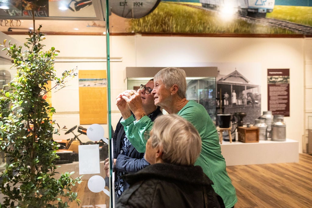people enjoying the Scott Sisters exhibition