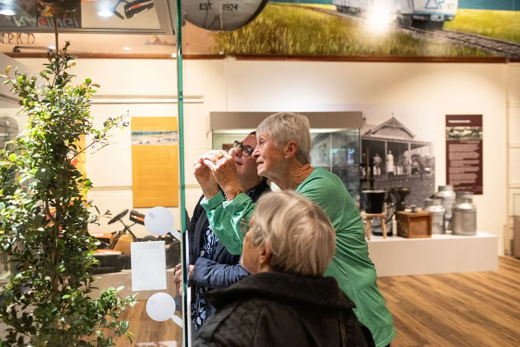 people enjoying the Scott Sisters exhibition