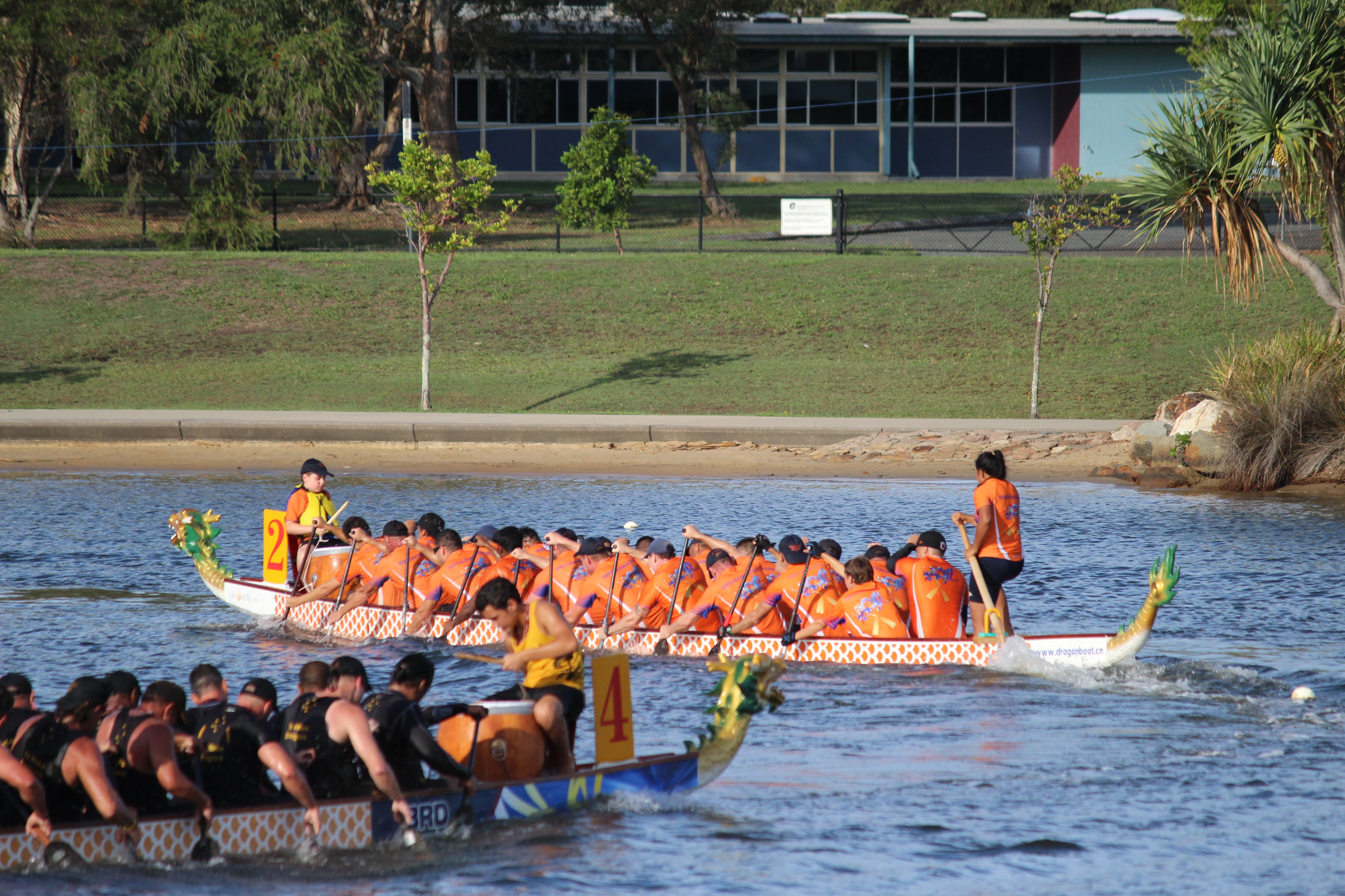Two dragon boats on the lake.