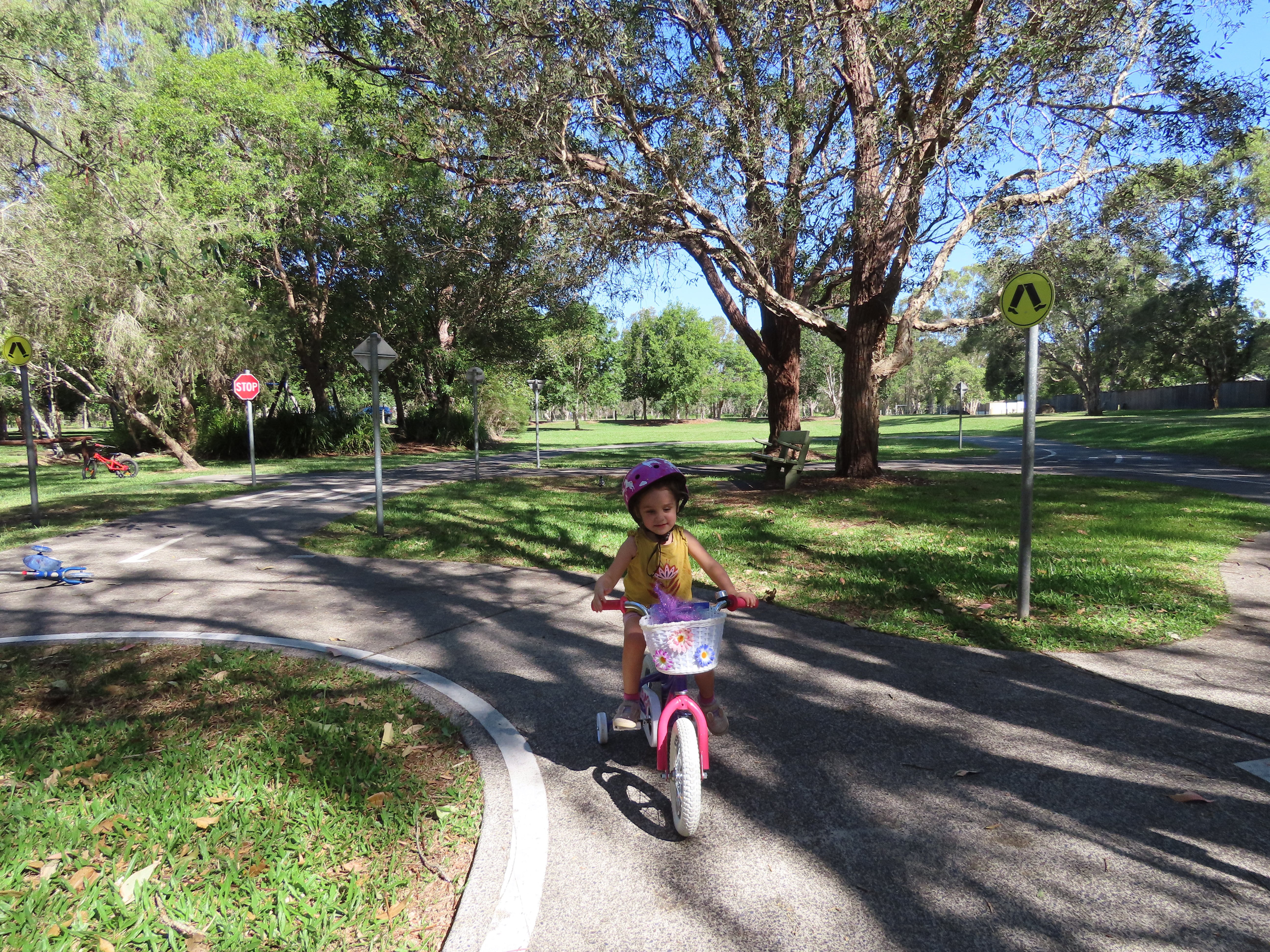 Little Mountain Common park child on bike path