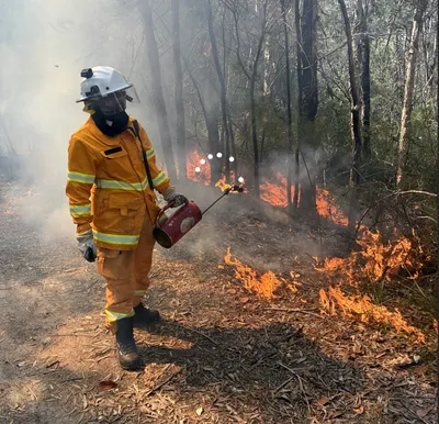 firefighter conducting a planned burn