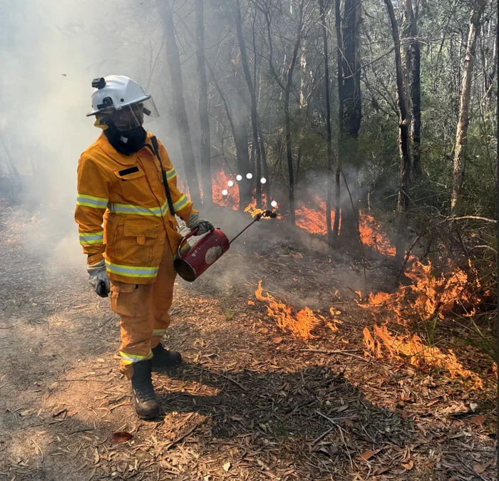 firefighter conducting a planned burn