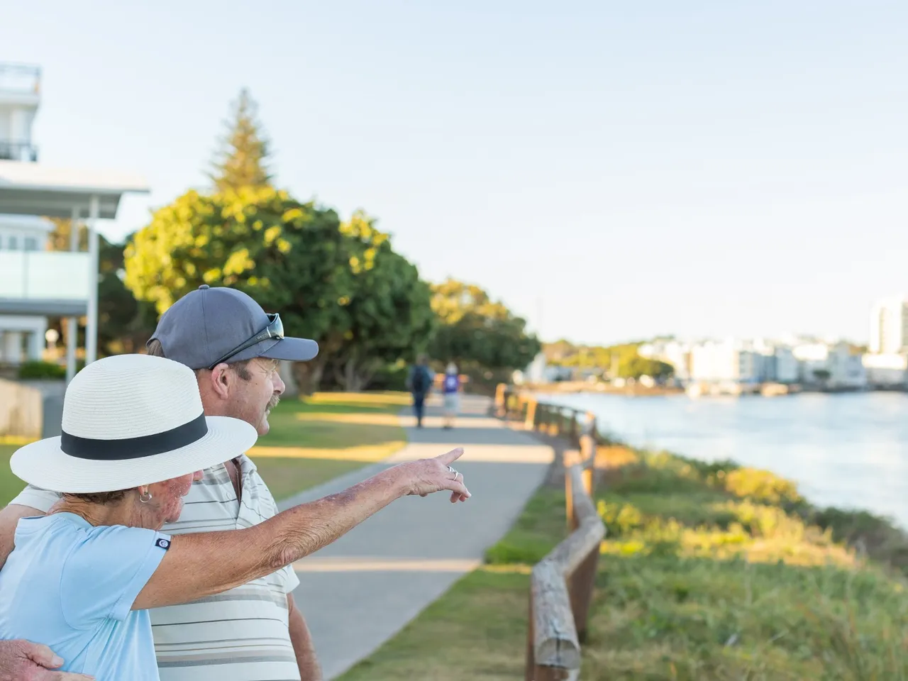 Elderly couple enjoying the coastal pathway at Golden Beach