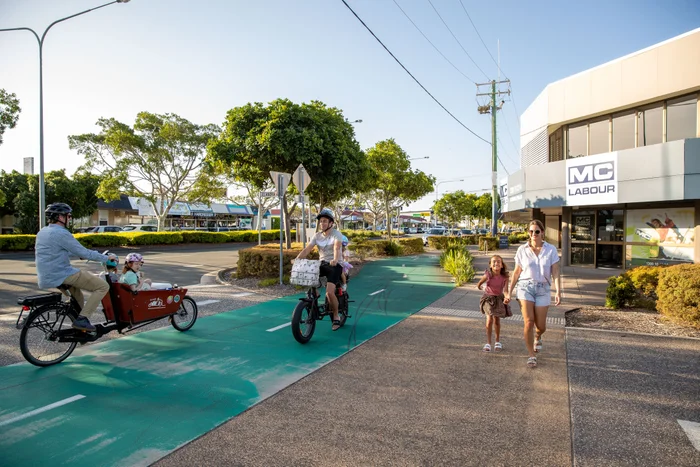 People riding and walking on active transport infrastructure on the Sunshine Coast