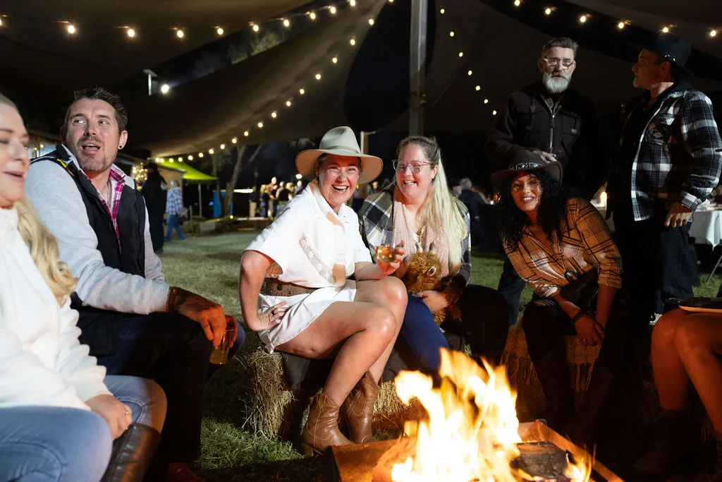 People sitting around a firepit