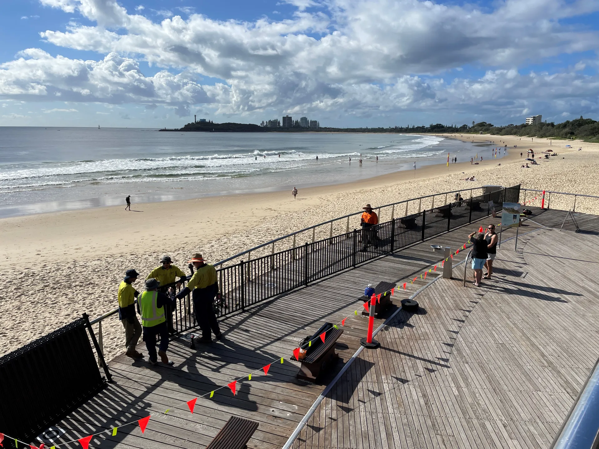 Construction of pedestrian barrier along cantilevered deck.