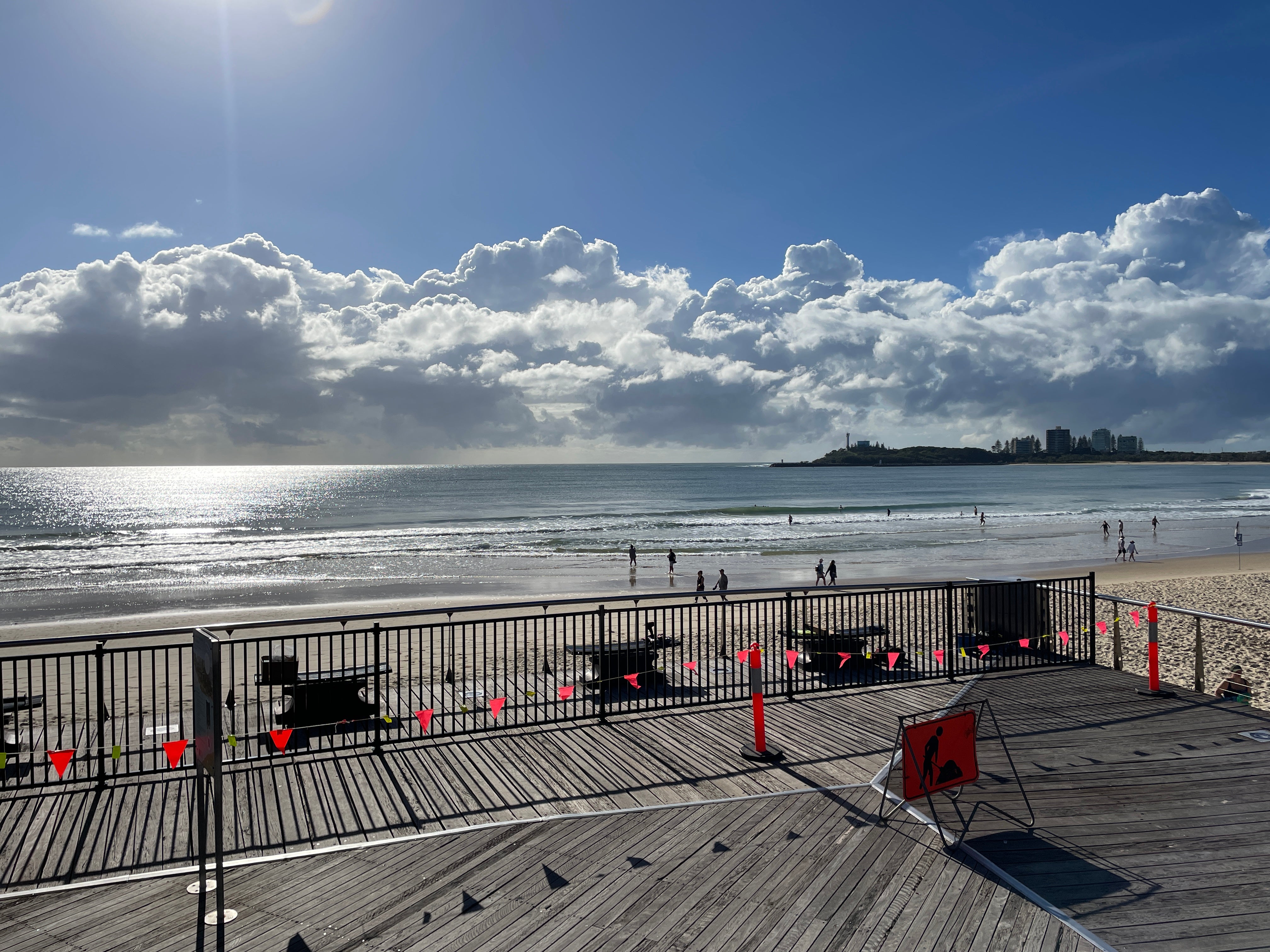 Construction of pedestrian barrier along cantilevered deck. 