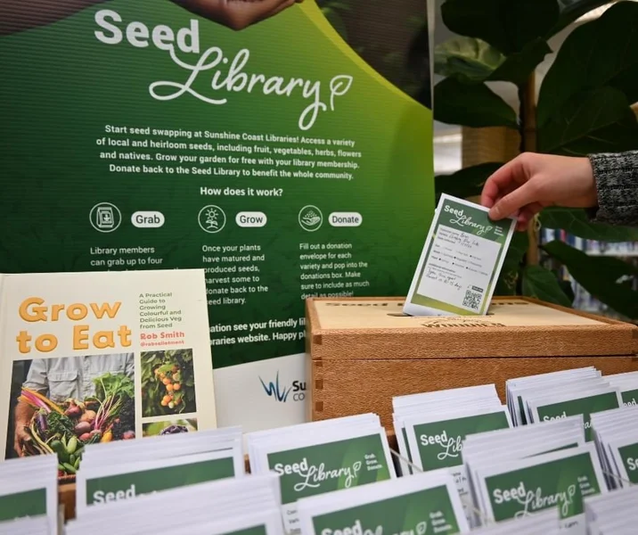 Library member donating seeds back to Sunshine Coast Libraries Seed Library