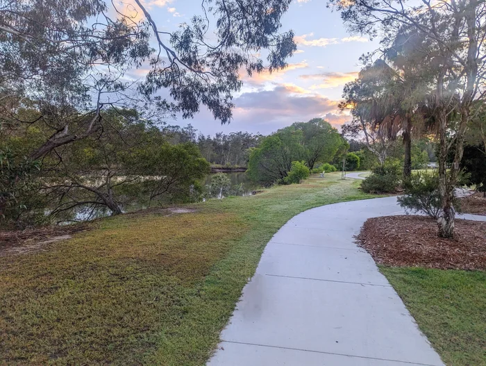 Pathway next to a lake. 