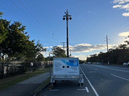 Data trailer parked on side of road