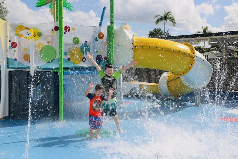 Logan-4-and-Jordan-8-cool-off-at-Nambours-new-splash-pad-scaled.jpg