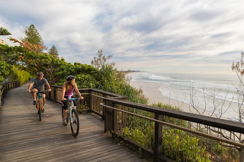 Coastal-Pathway-couple-bike-boardwalk-riding-1-COOLUM-WEB.jpg