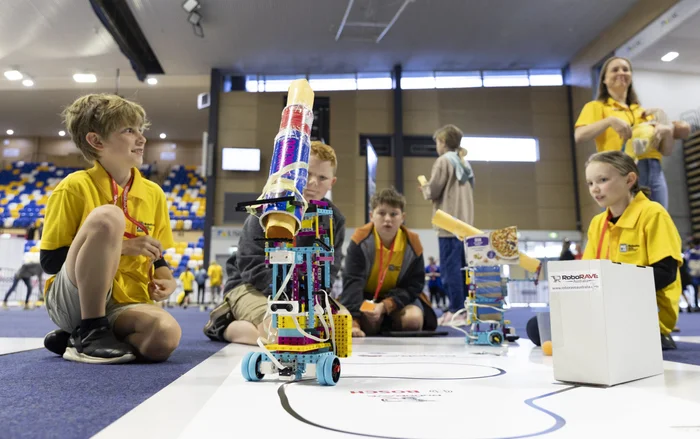 Students-with-their-robots-at-RoboRAVE-Australia-2022-scaled.jpg