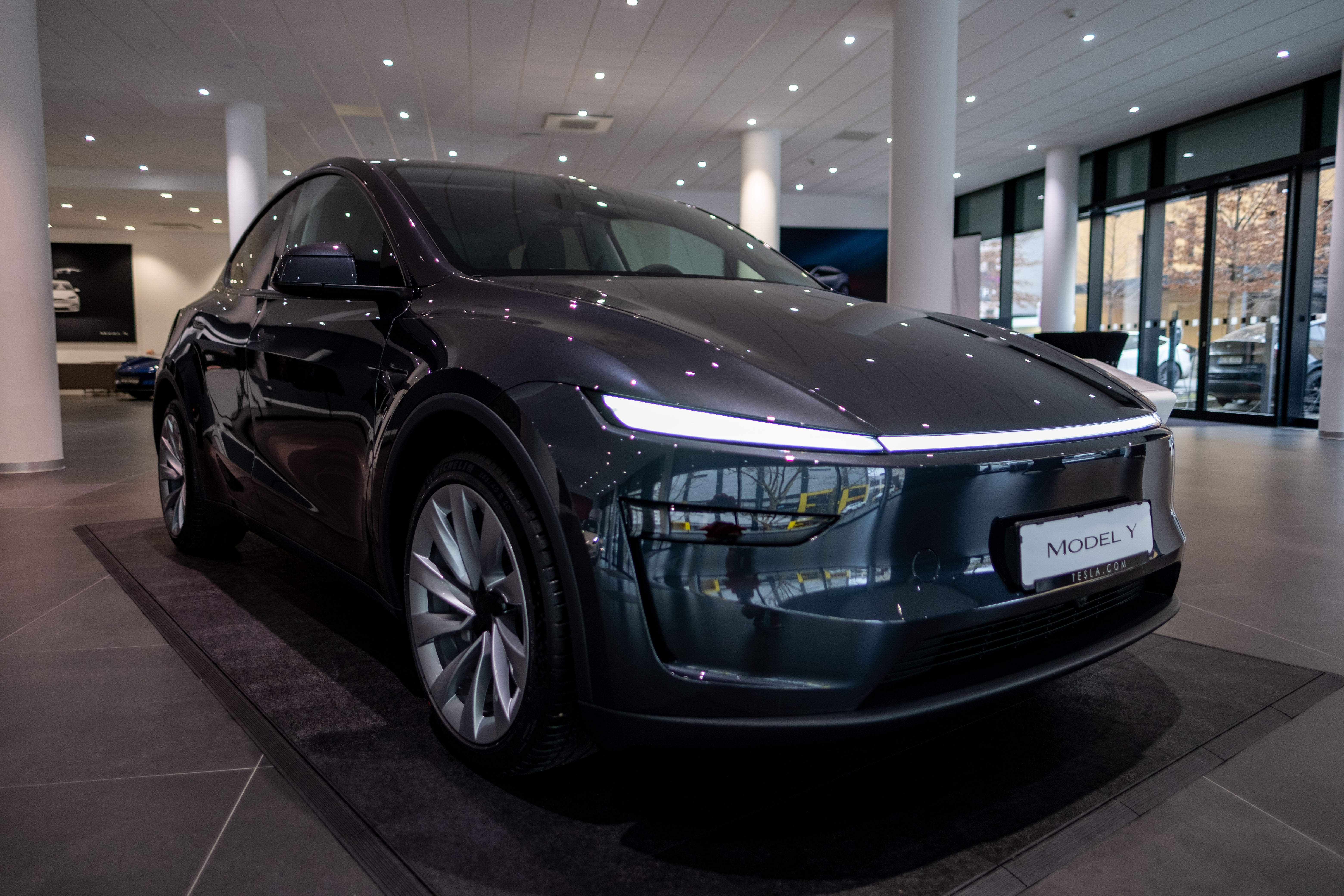 Tesla Model y in a showroom - editorial use only