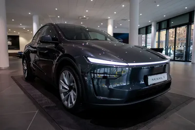 Tesla Model y in a showroom - editorial use only