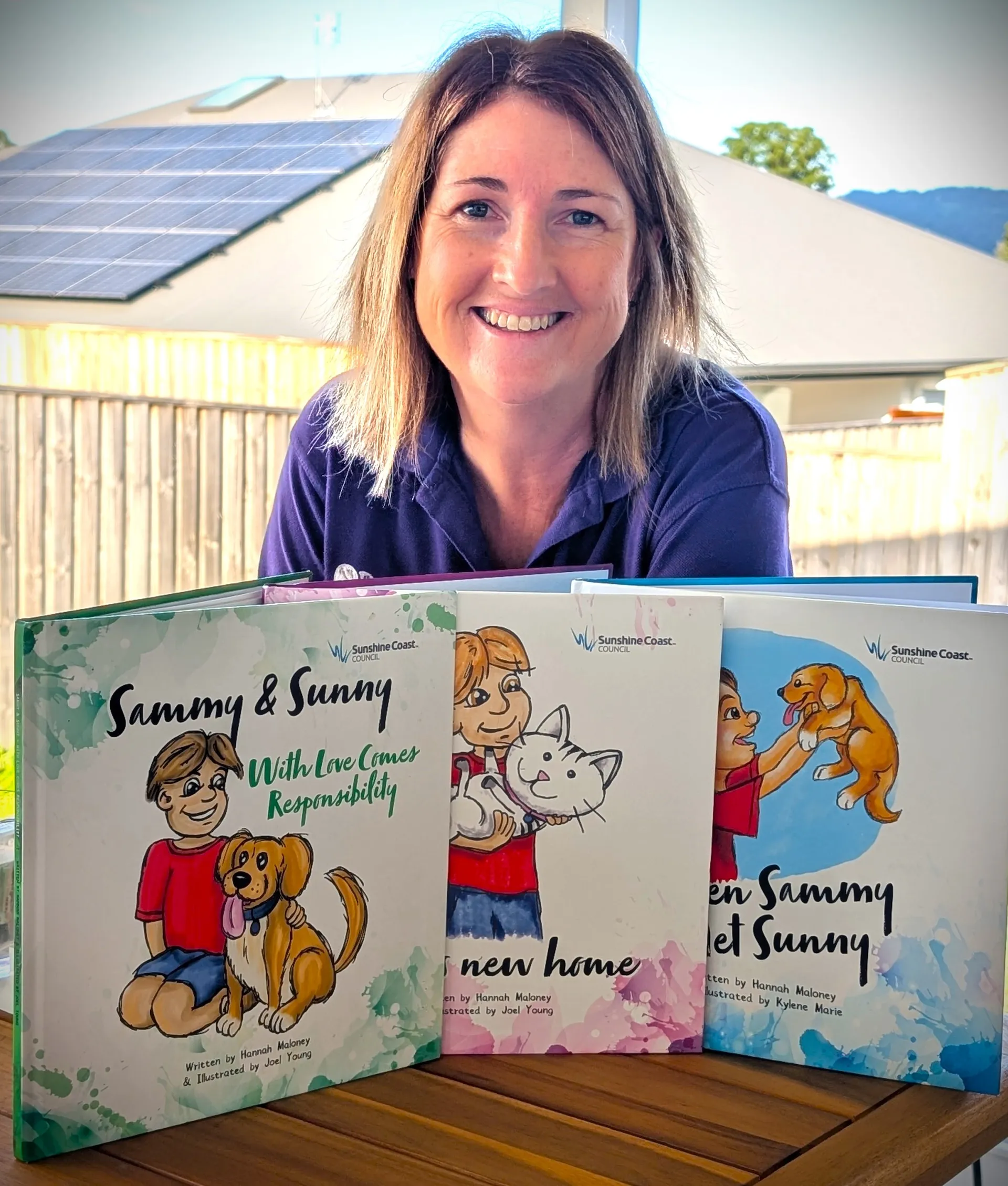Author Hannah Maloney with Council’s Responsible Pet books.