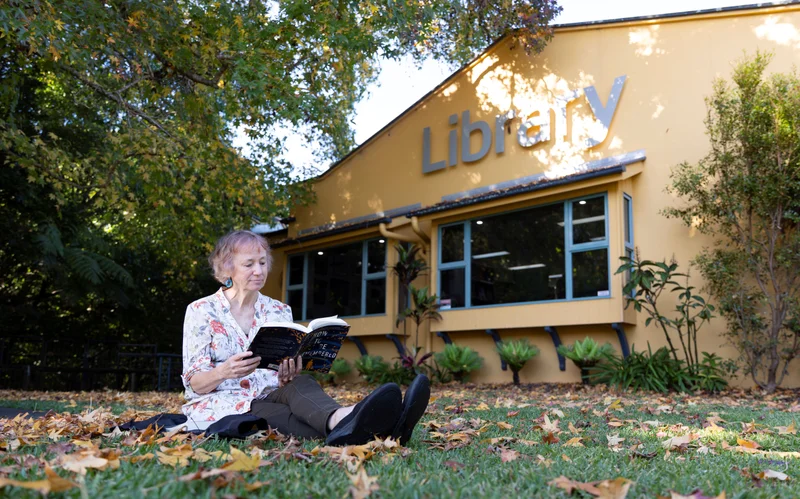 Reading a great book from Sunshine Coast Libraries in the garden. 