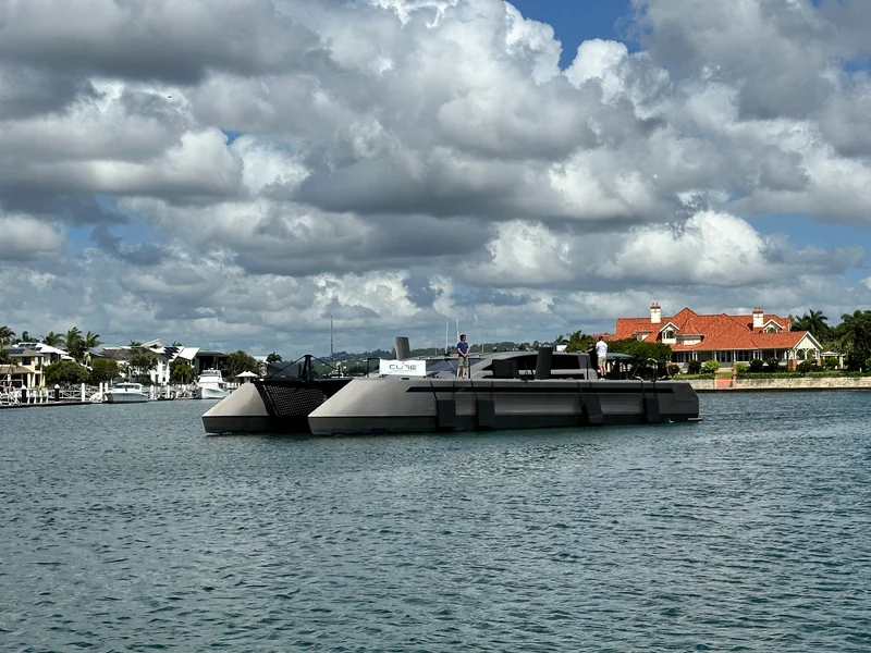 'Noire' the 70-foot all-carbon fibre Catamaran cruising the Mooloolaba Canals