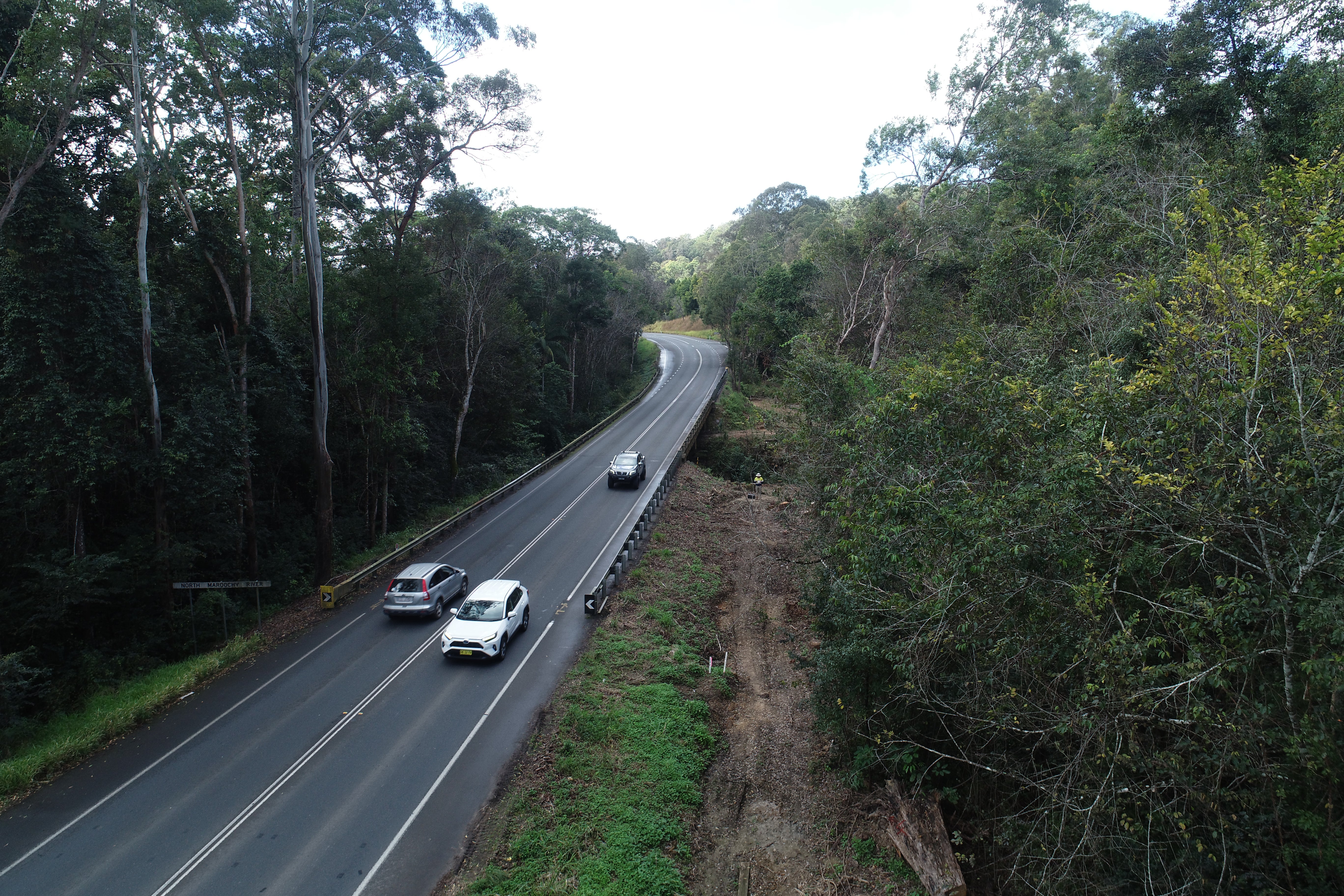 Aerial vision of cars driving along Seib Road, Eumundi. 