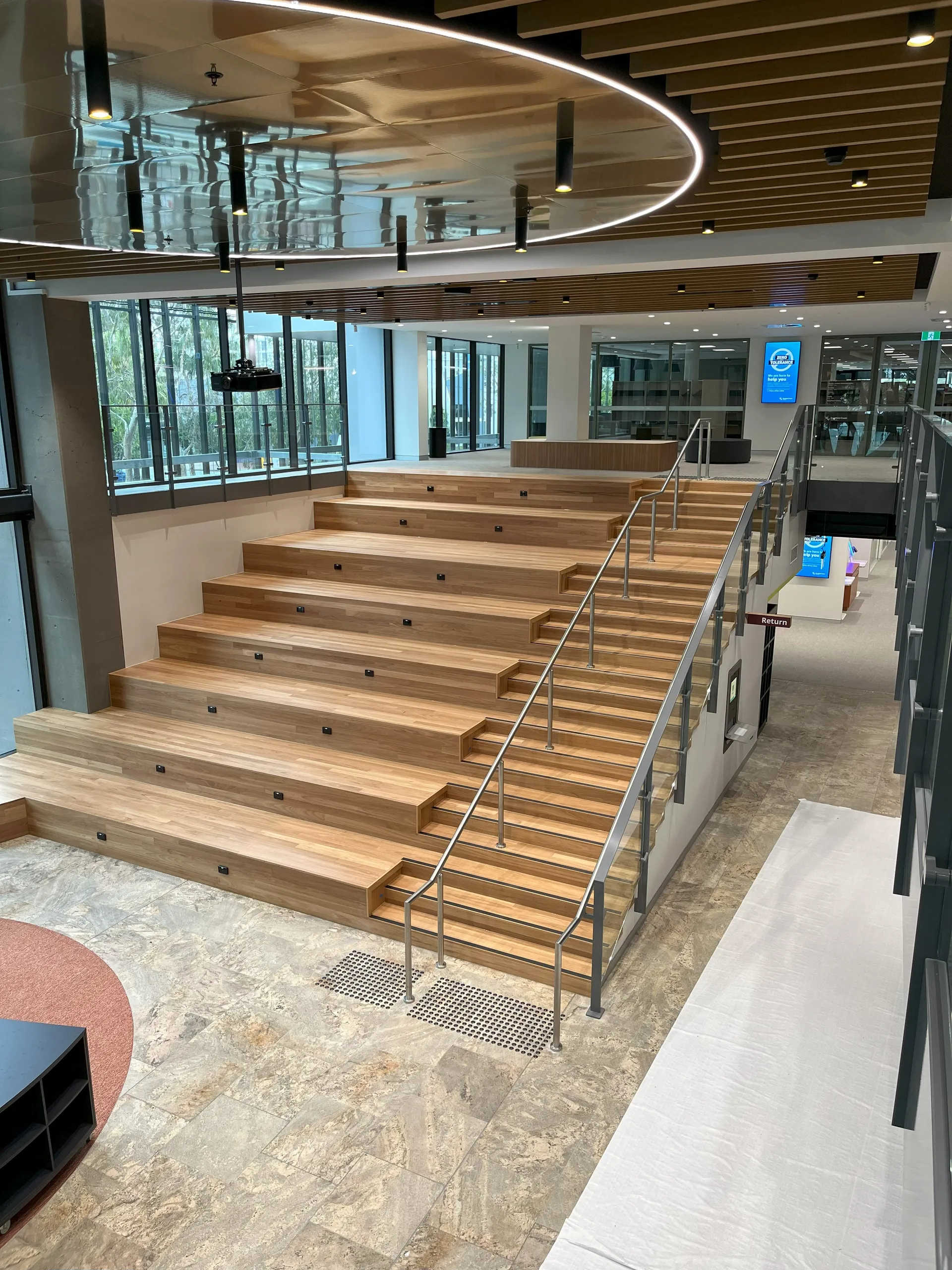 Tiered seating in the lobby of the new Library+ Caloundra.