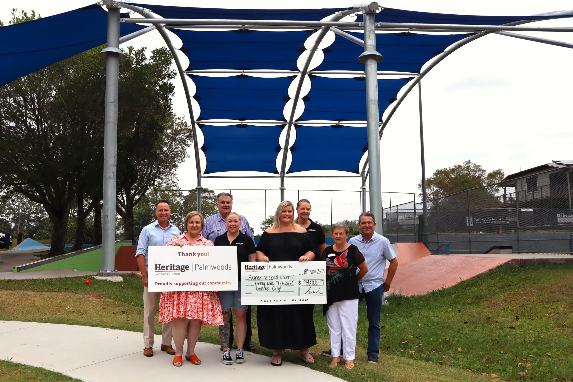 Councillor Winston Johnston alongside Heritage Palmwoods Community Branch members.