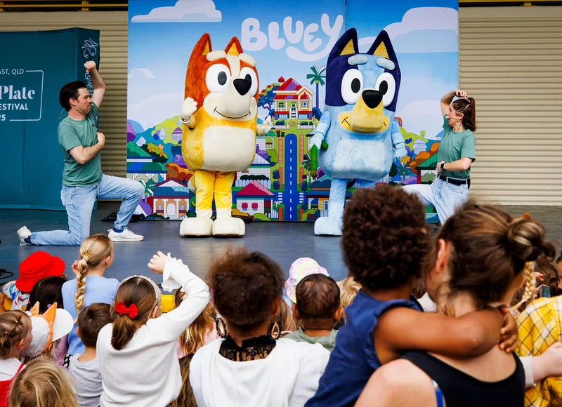 Kids characters Blue and Bingo on stage with two fellow entertainers