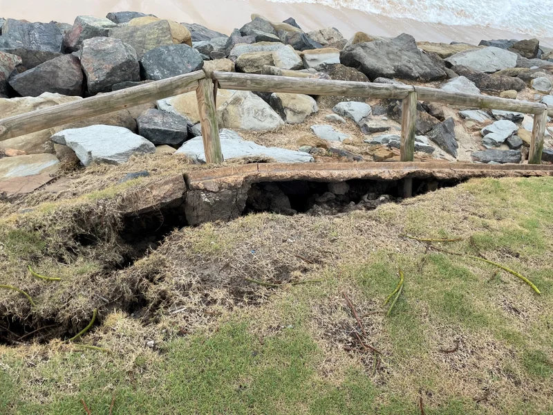 Cracking and damage to the Moffat Beach seawall in March 2022