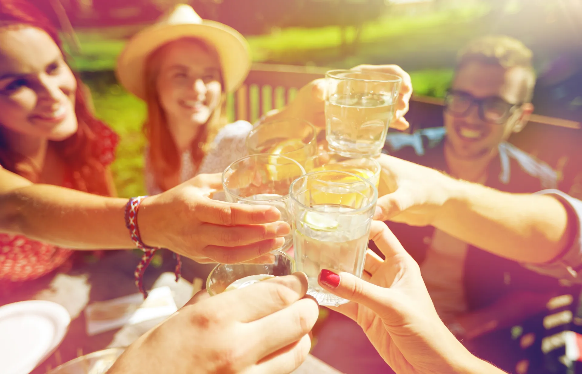 people enjoying cocktails on a sunny day