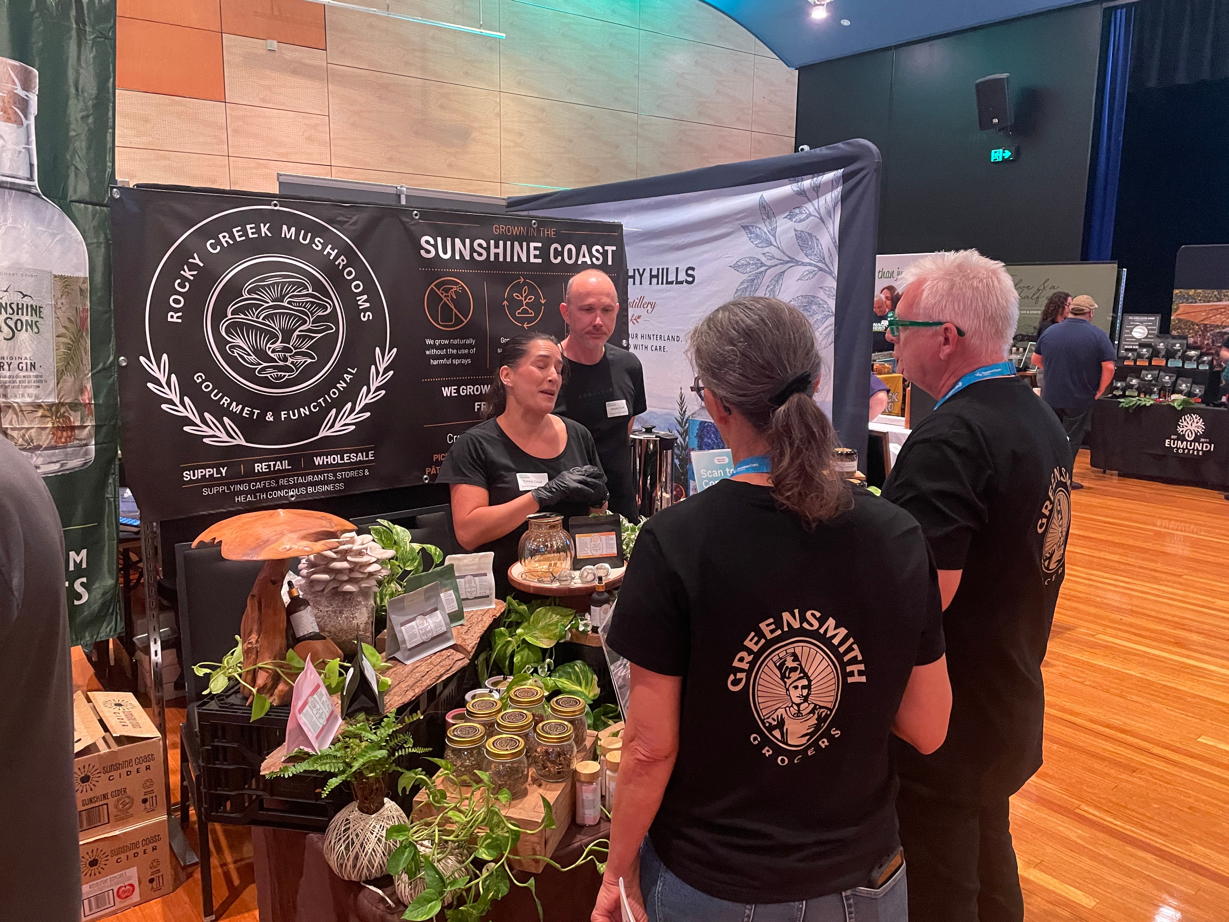 Meet the Makers: Rocky Creek Mushrooms representatives talking to potential buyers
