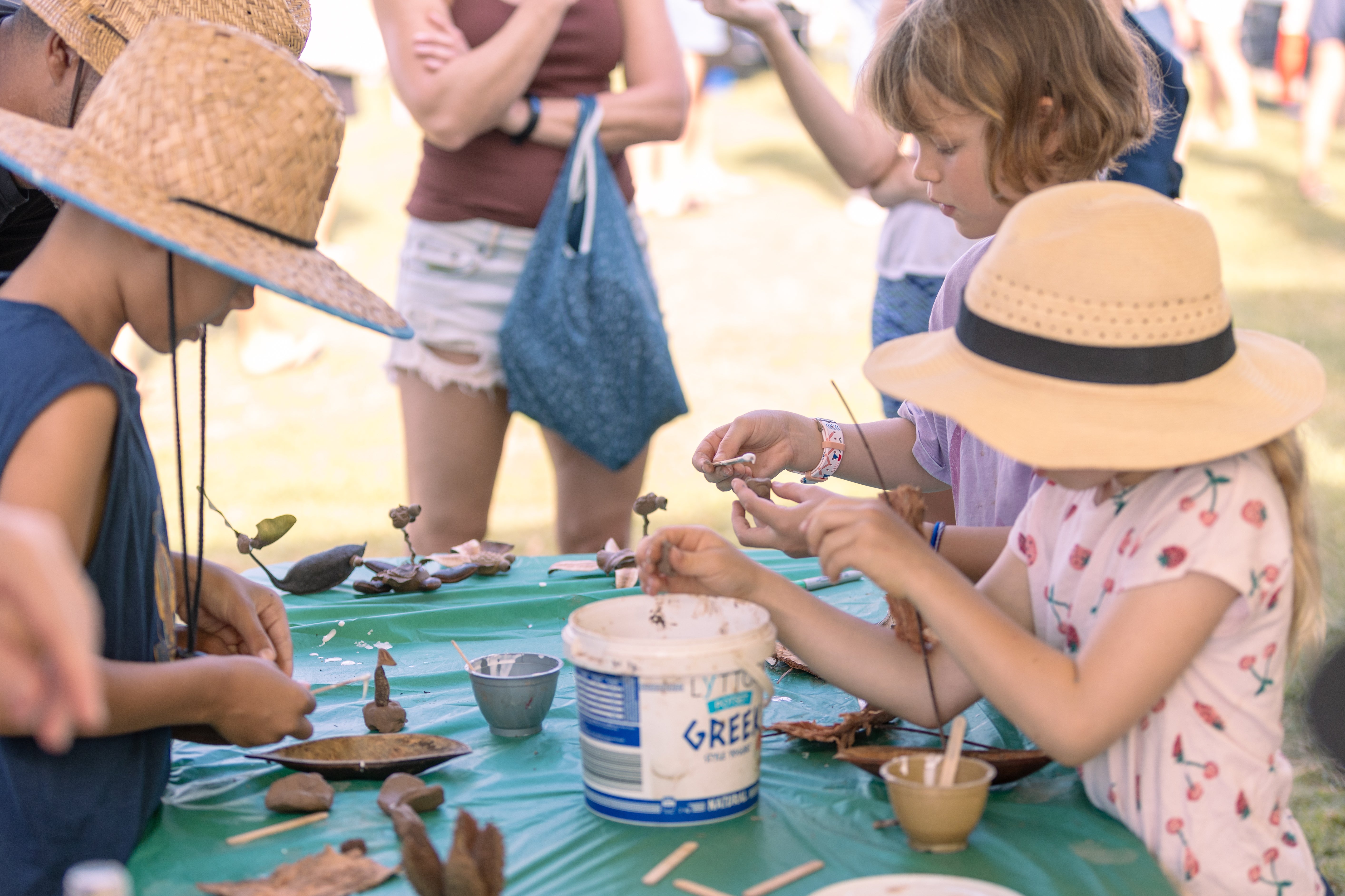 A group of children doing craft activities at the Clean up for the hatchlings event.