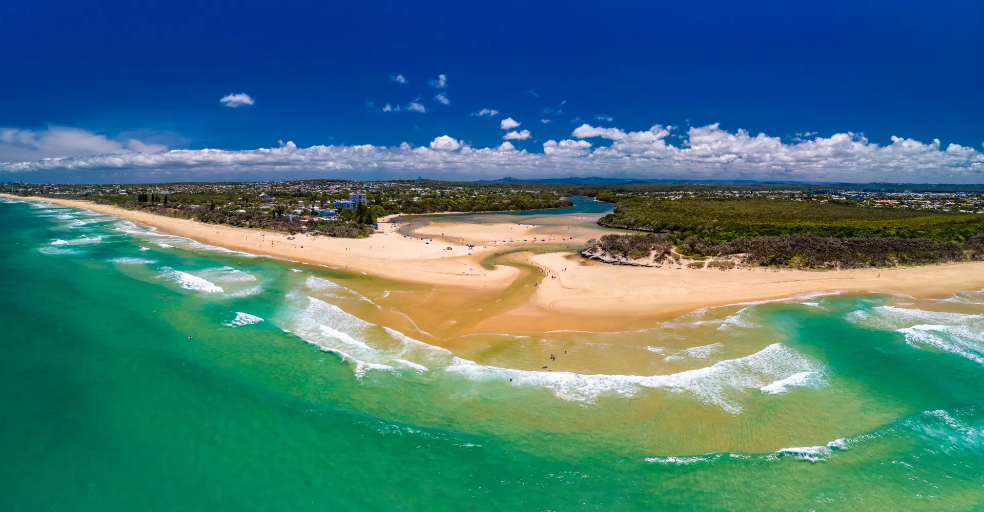 Aerial drone view of beach at Currimundi Lake, Caloundra, Sunshine Coast, Queensland, Australia