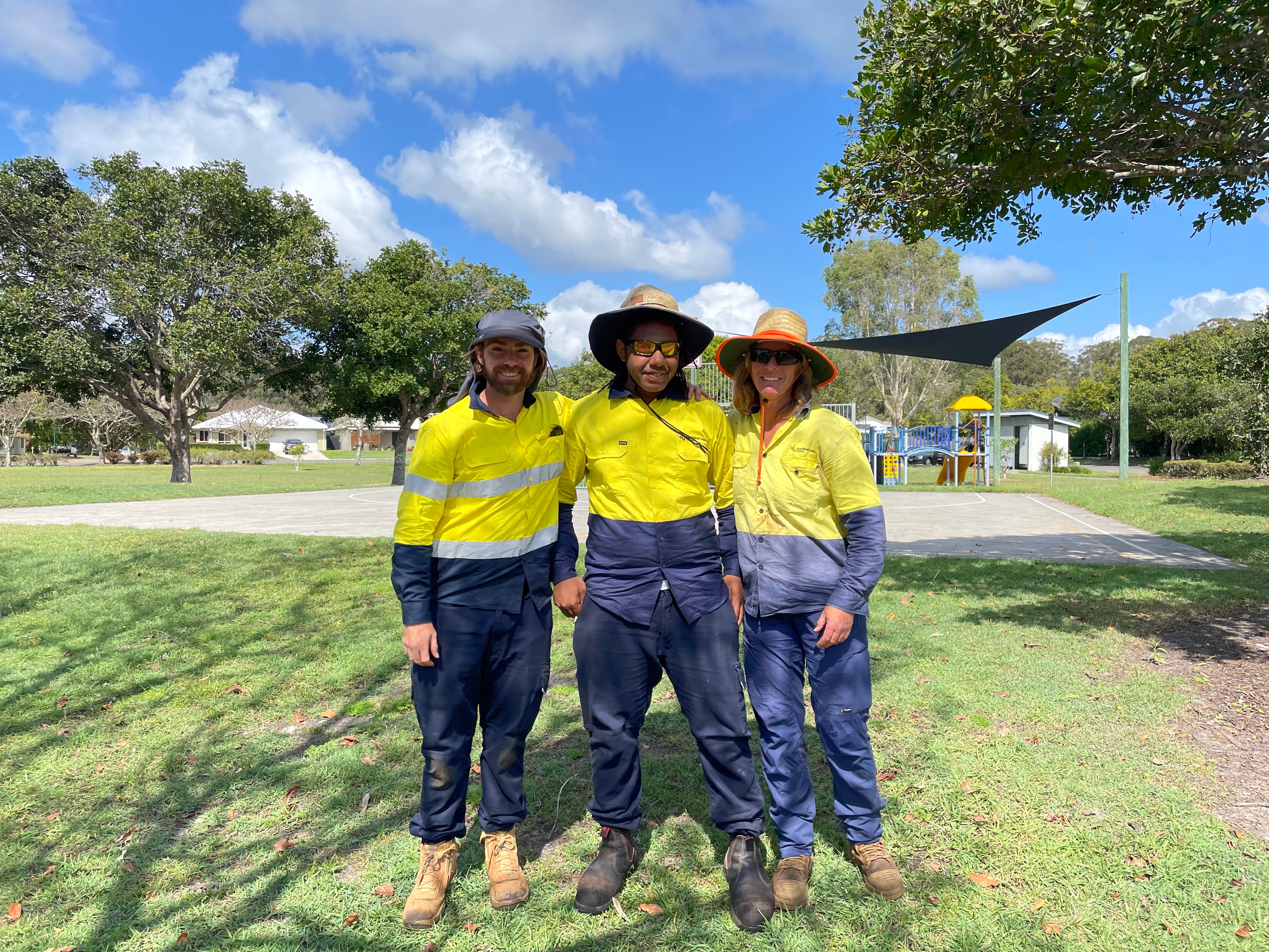 Work expereince student with Parks staff at playground