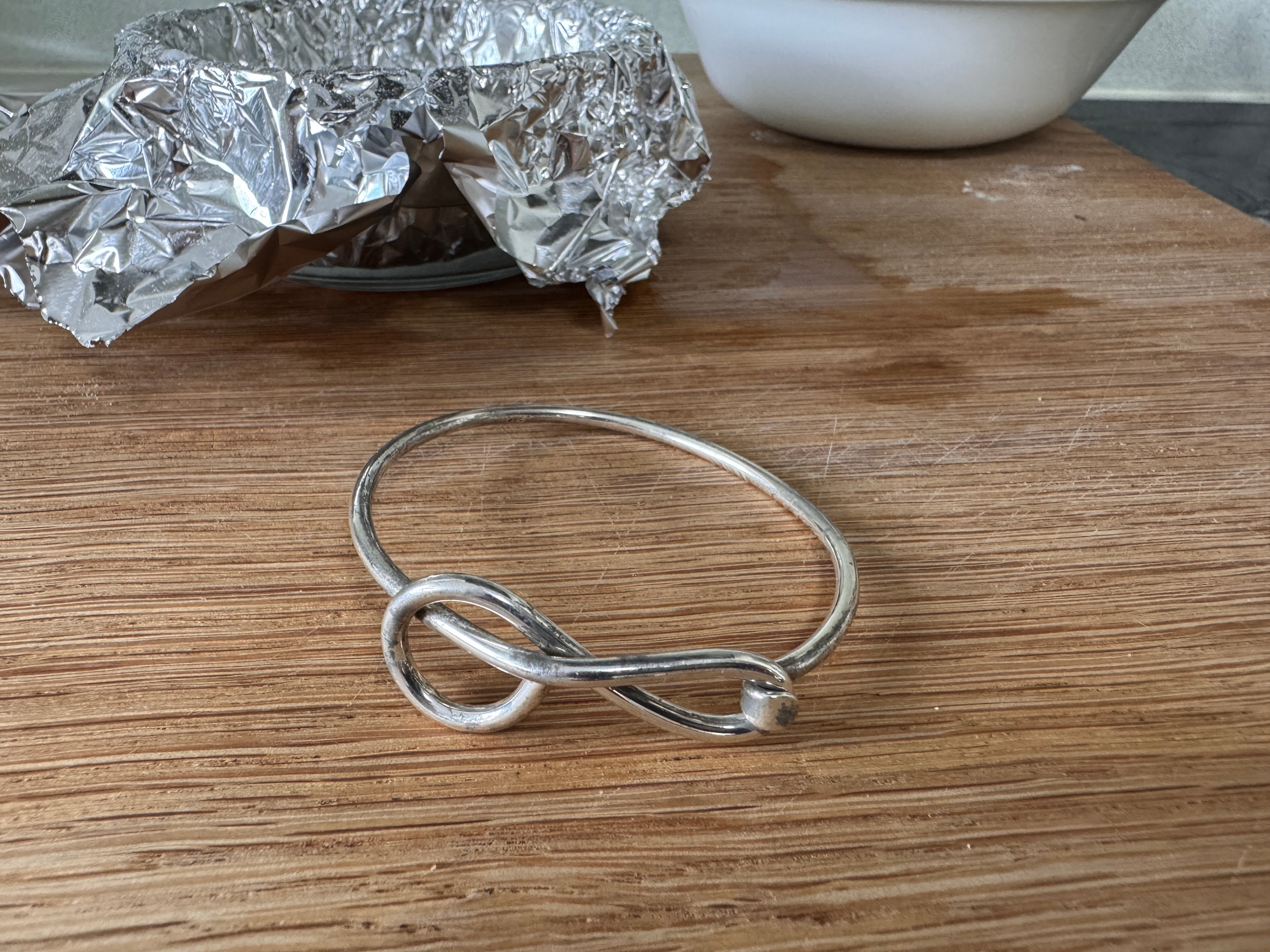 shiny bangle that's been buffed