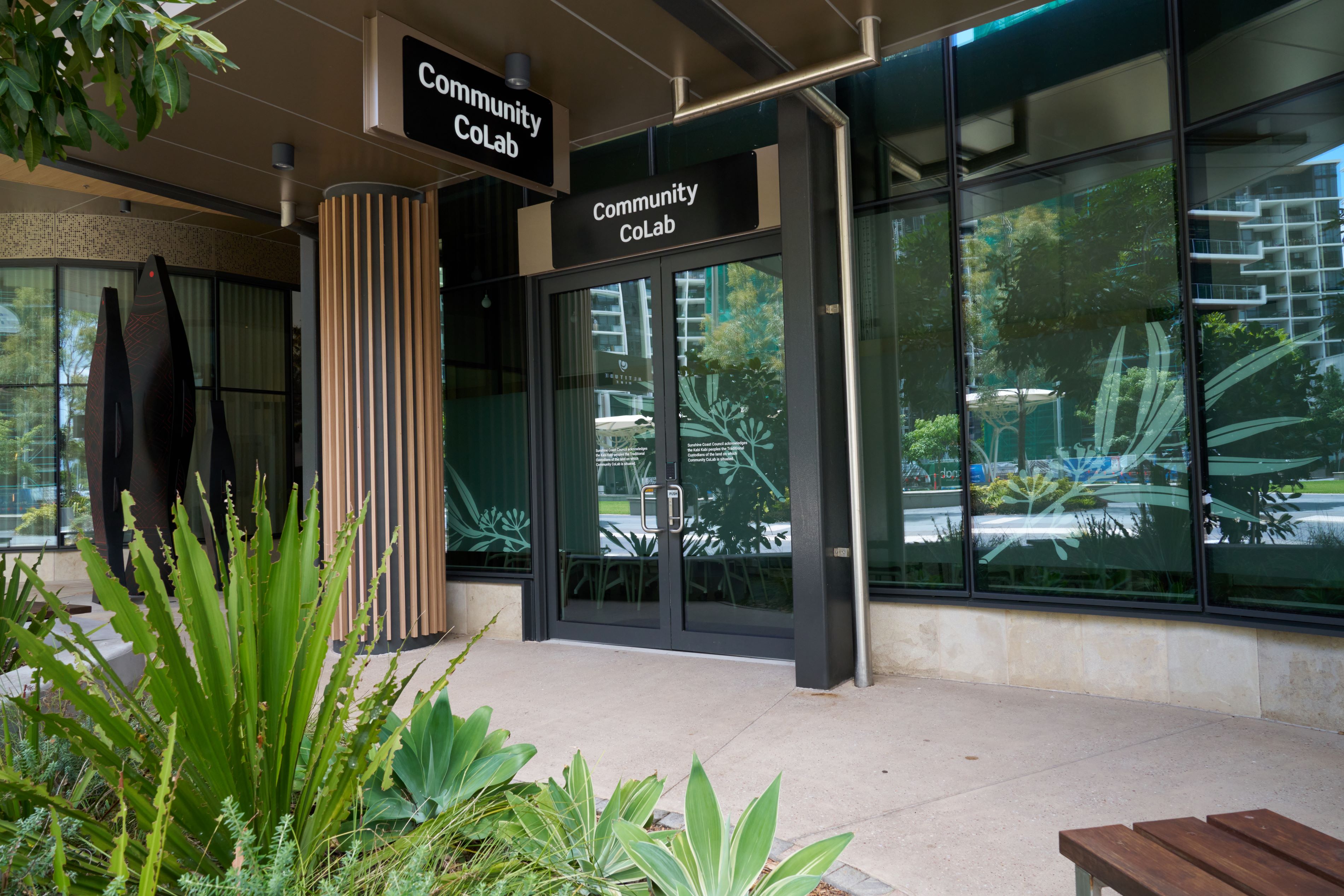 Community meeting room entrance with glass windows