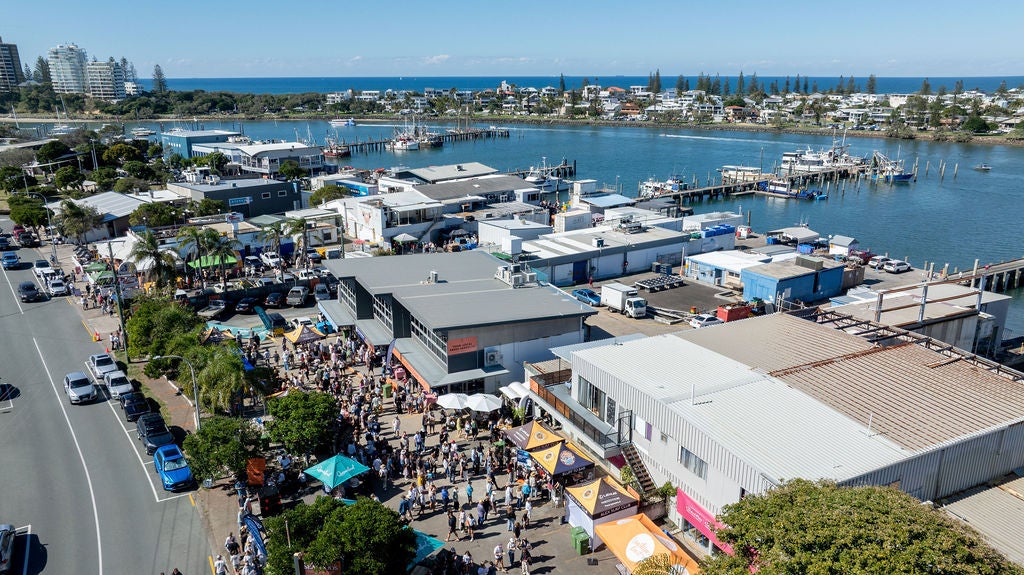 A birds eye view of festival participants wandering The Spit, Mooloolaba