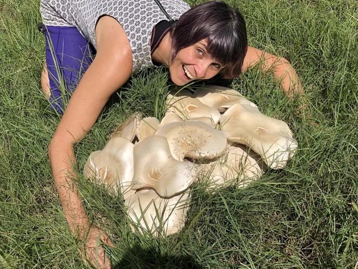 Sandra-Tuszynska-with-giant-fungi-1-scaled.jpeg