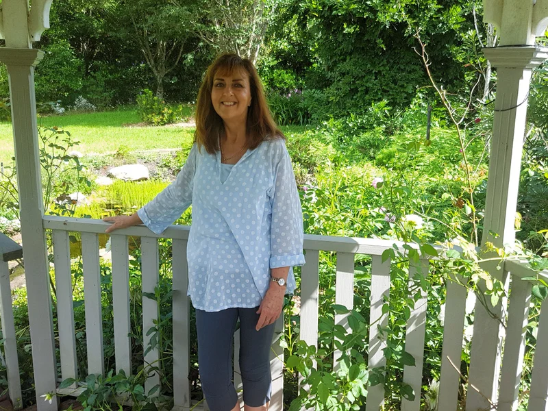 Anne Gibson in her garden