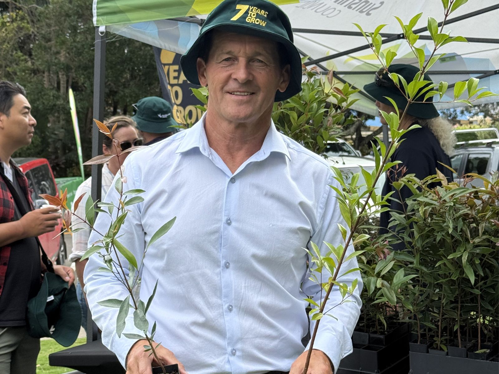 Councillor Landsberg at tree planting event. 