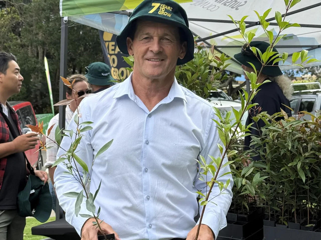 Councillor Landsberg at tree planting event.