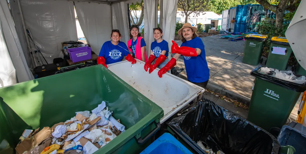 Caloundra Music Festival volunteers - Waste Warriors sorting rubbish on site at the 2022 event.