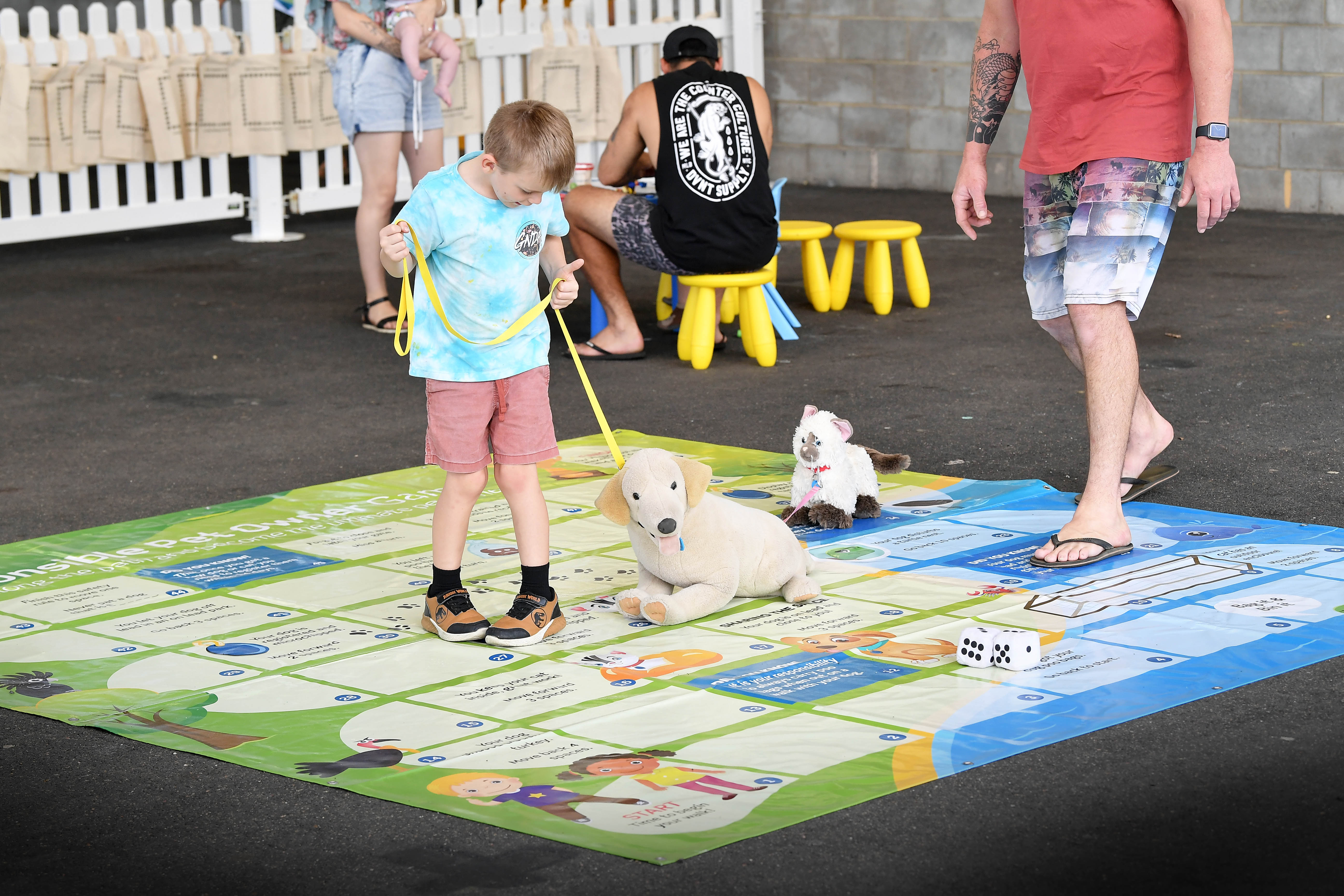Enjoying snakes and ladders in the Kids Zone