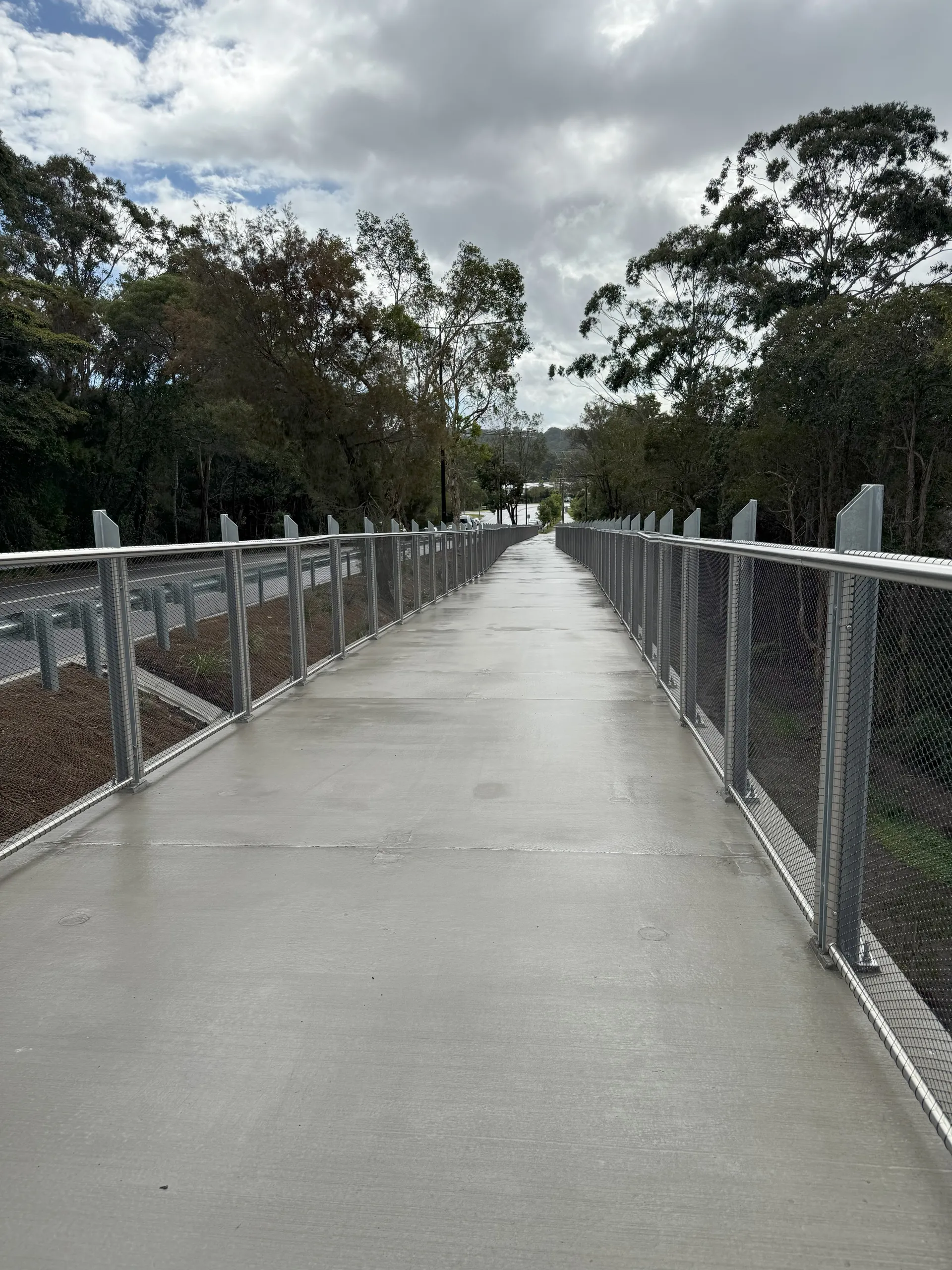 Wide concrete pathway along Stringybark Road, Sippy Downs.