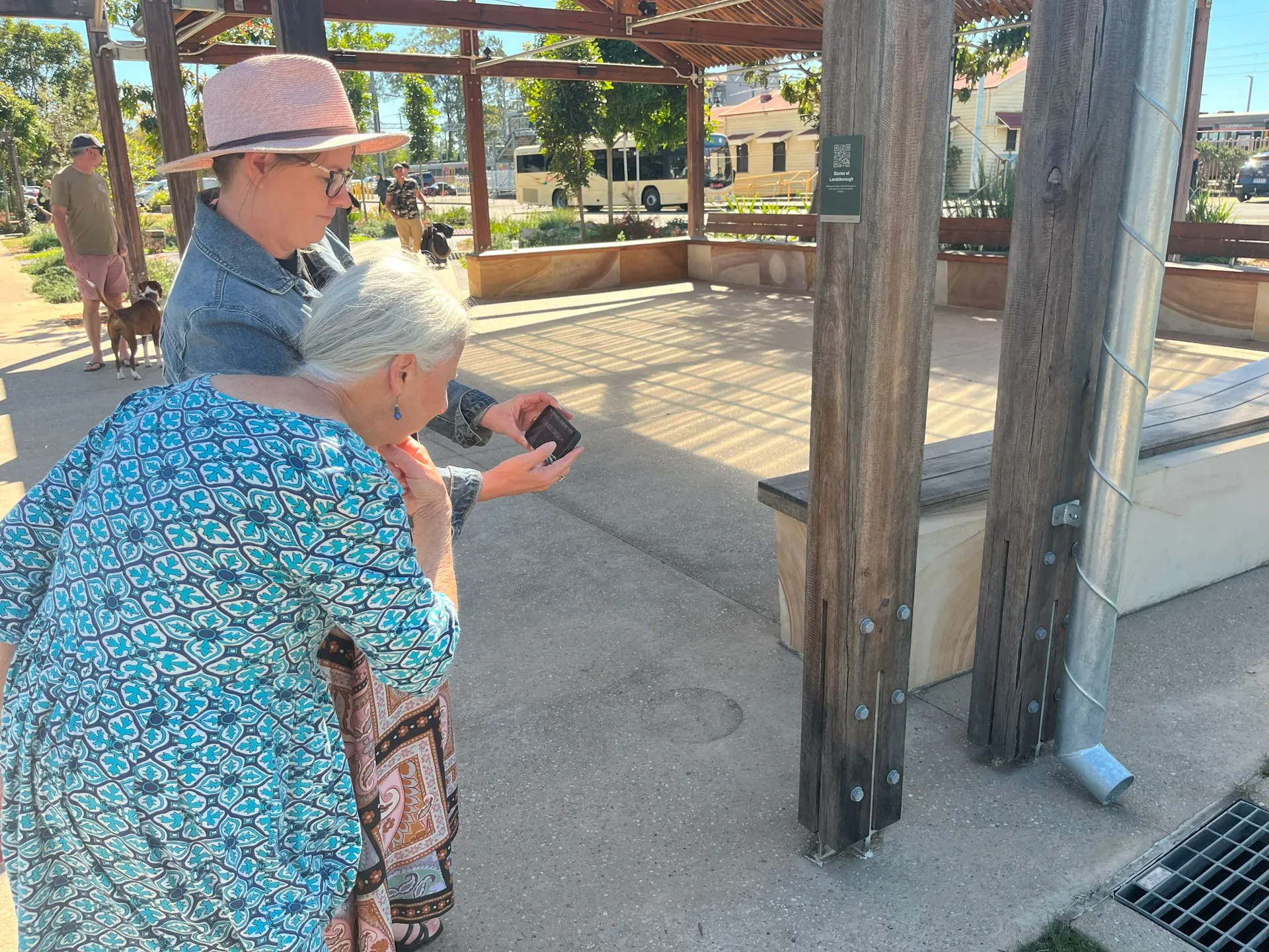 Sunshine Coast Division 1 Councillor Jenny Broderick (left) with Diana Michaels scanning a QR code on the Landsborough Heritage Walk.