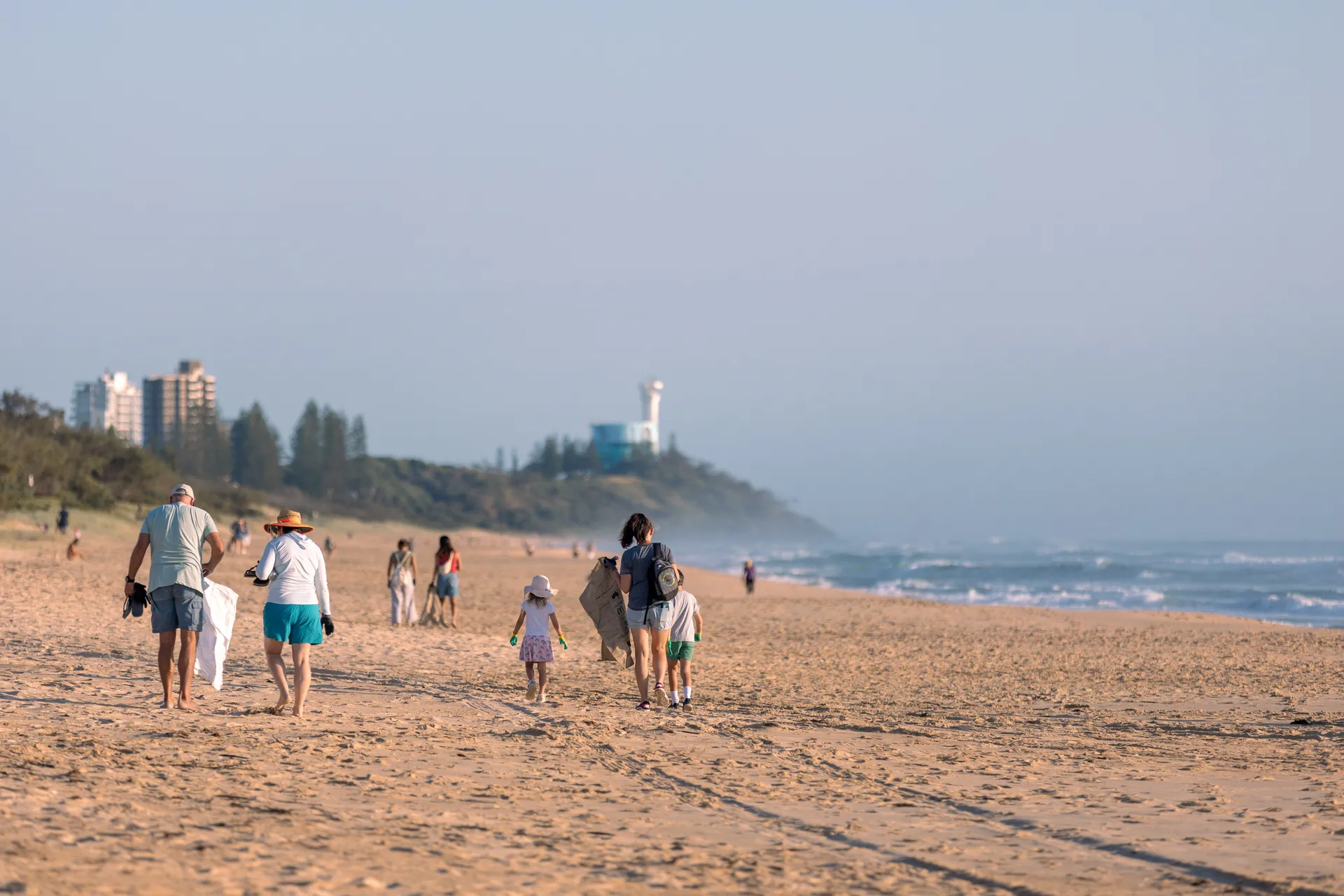 Families walking on beach