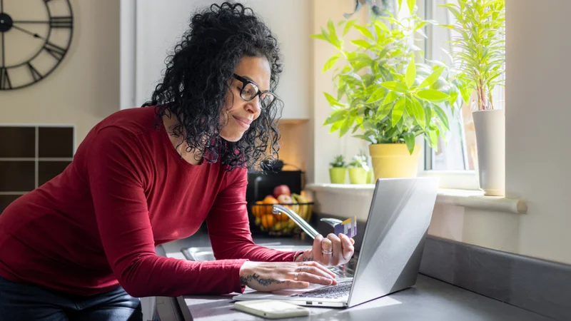 Woman paying her Council rates.