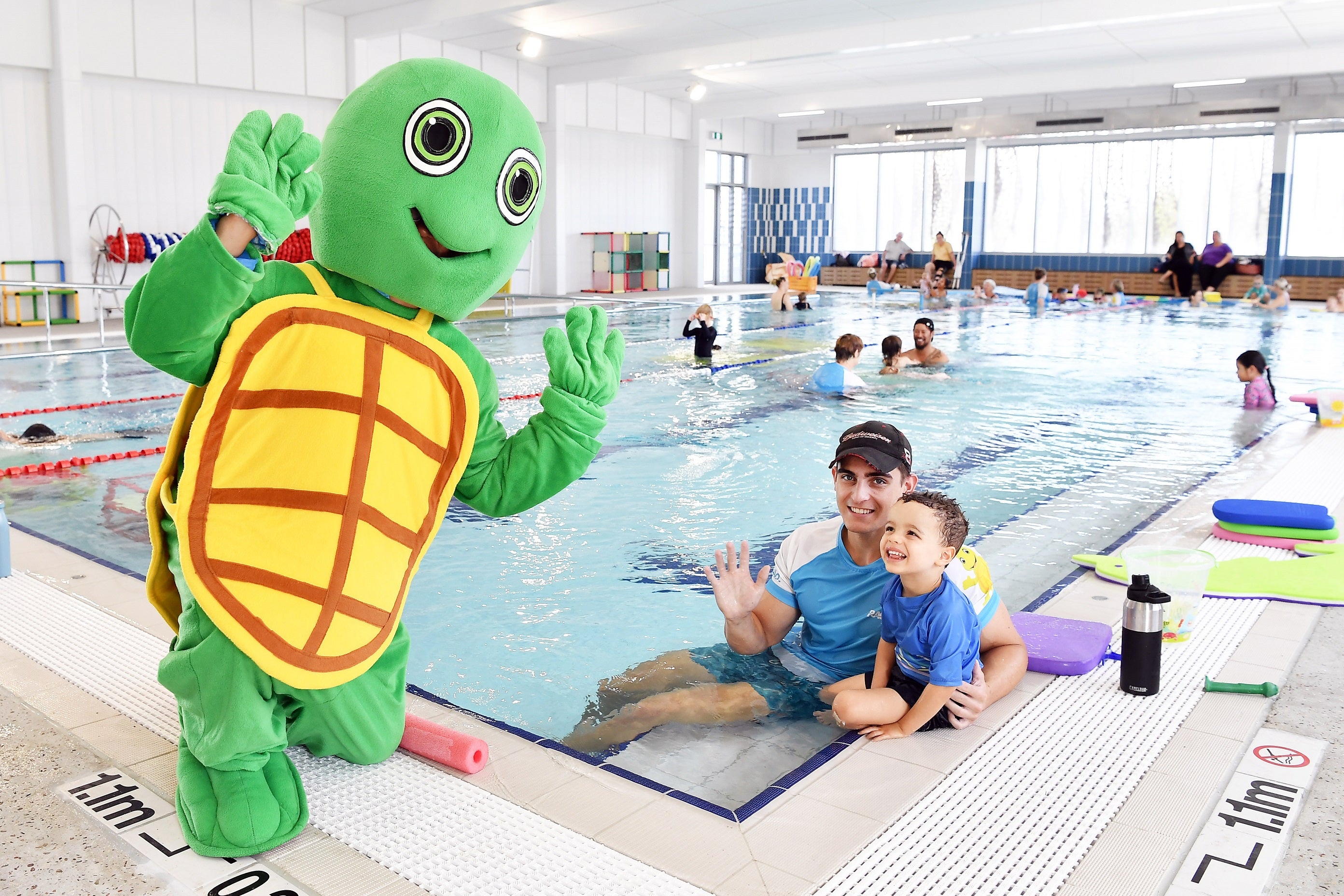 Rackley Swimming Instructor Angus Hornery with Isaac Windsor.