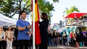Community gathers for flag raising and cultural celebrations