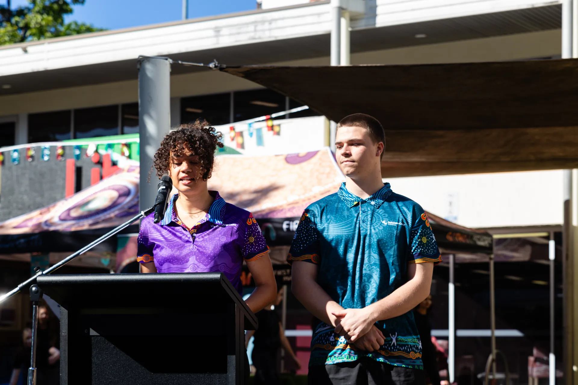 First Nations Youth speaking to the crowd.