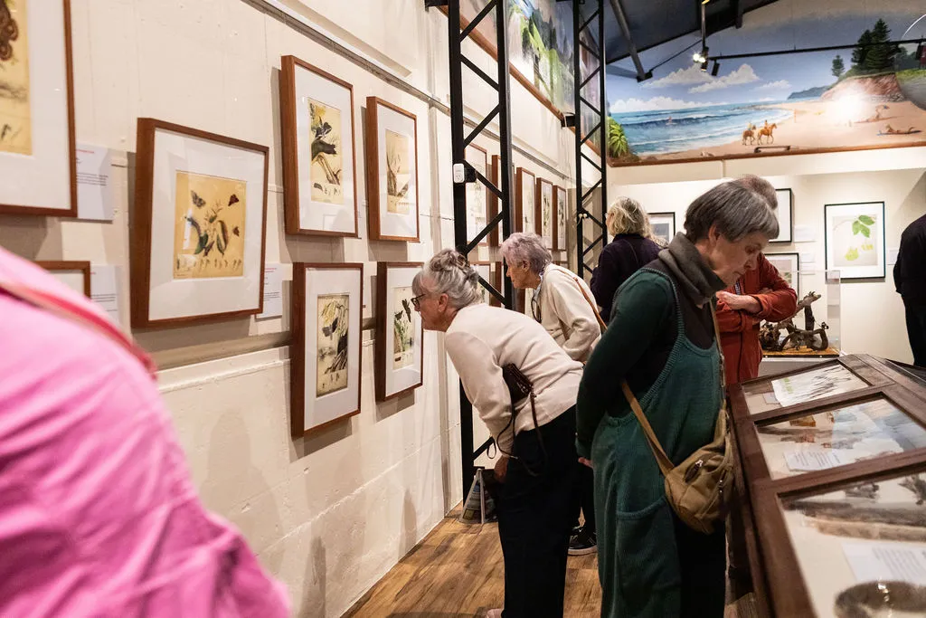 people enjoying the Scott Sisters exhibition